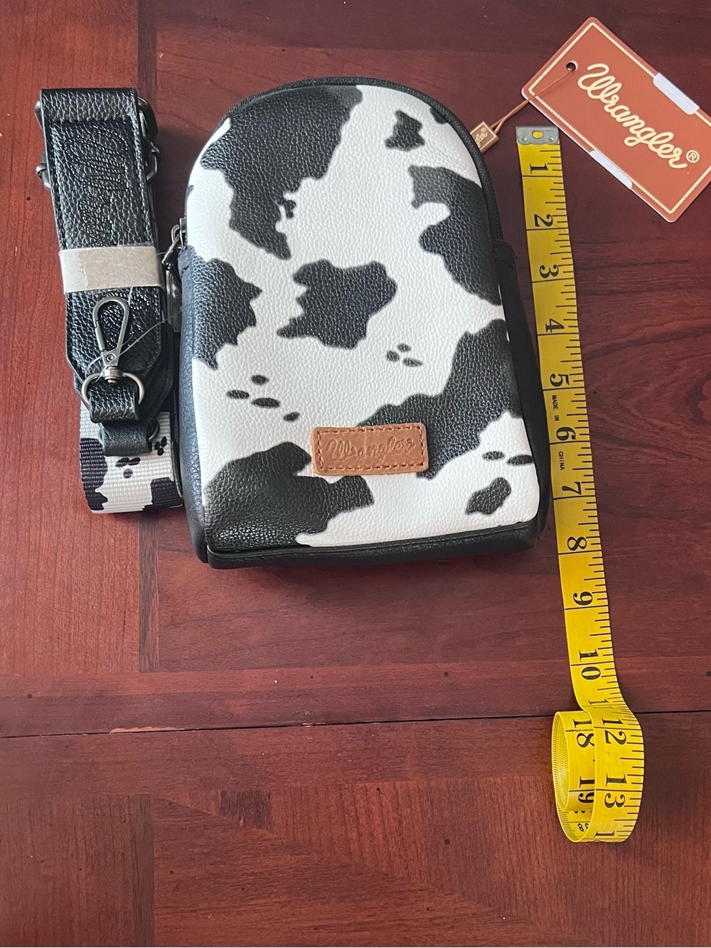 Wrangler Black & White Cow Print Crossbody Purse with Tan Patch